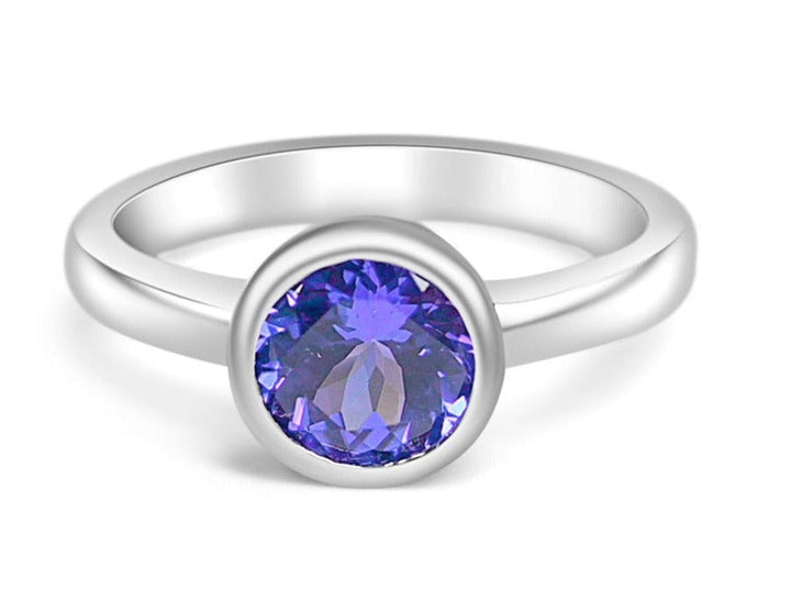 Bezel set tanzanite engagement ring featuring a round gemstone in a sleek silver band for a timeless look - Bezel Set Natural Tanzanite Engagement Ring