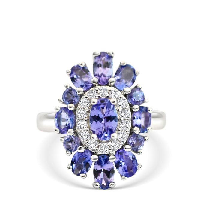 Unique Tanzanite jewelry gift featuring a 0.53ct oval tanzanite cluster ring with sparkling accents - 0.53ct Tanzanite Cluster Ring (Oval) (PJC19039R)