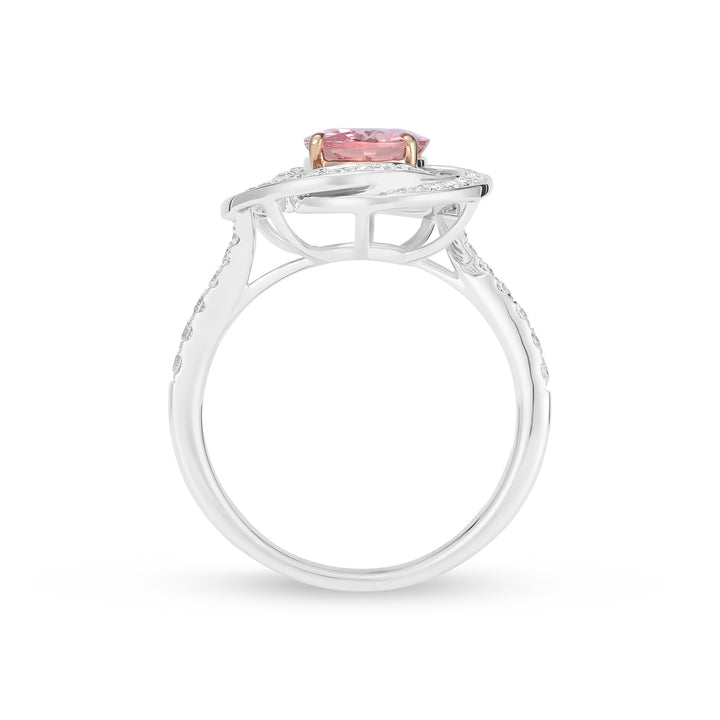 Ring with a pink gemstone on a white background