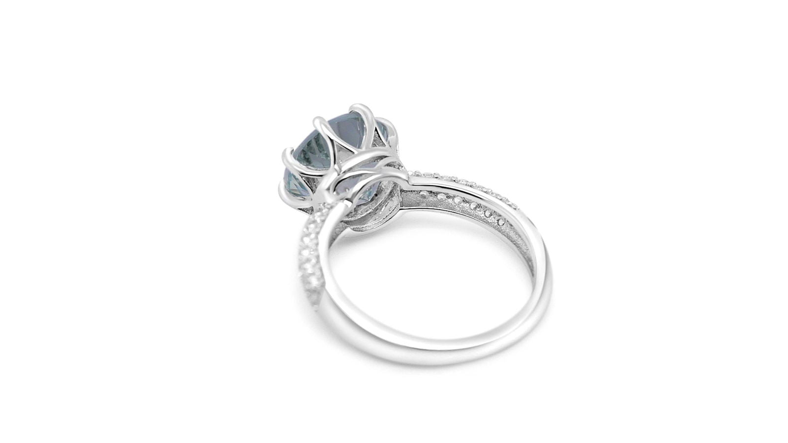 Elegant aquamarine silver ring for women featuring round aquamarine and CZ stones in rhodium plated 925 sterling silver