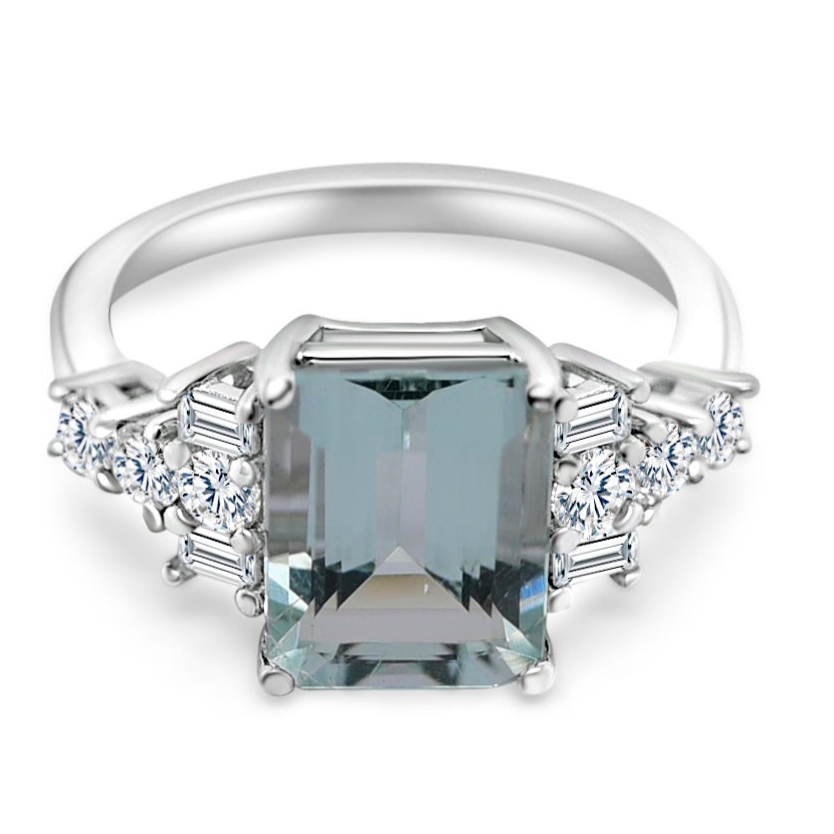 Emerald cut aquamarine engagement ring in sterling silver with sparkling side stones