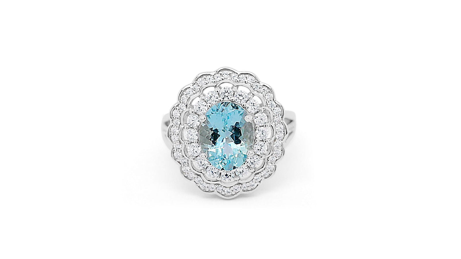 Oval Aquamarine Cluster Double Halo Cocktail Silver Ring For Womens featuring a stunning blue stone and sparkling accents