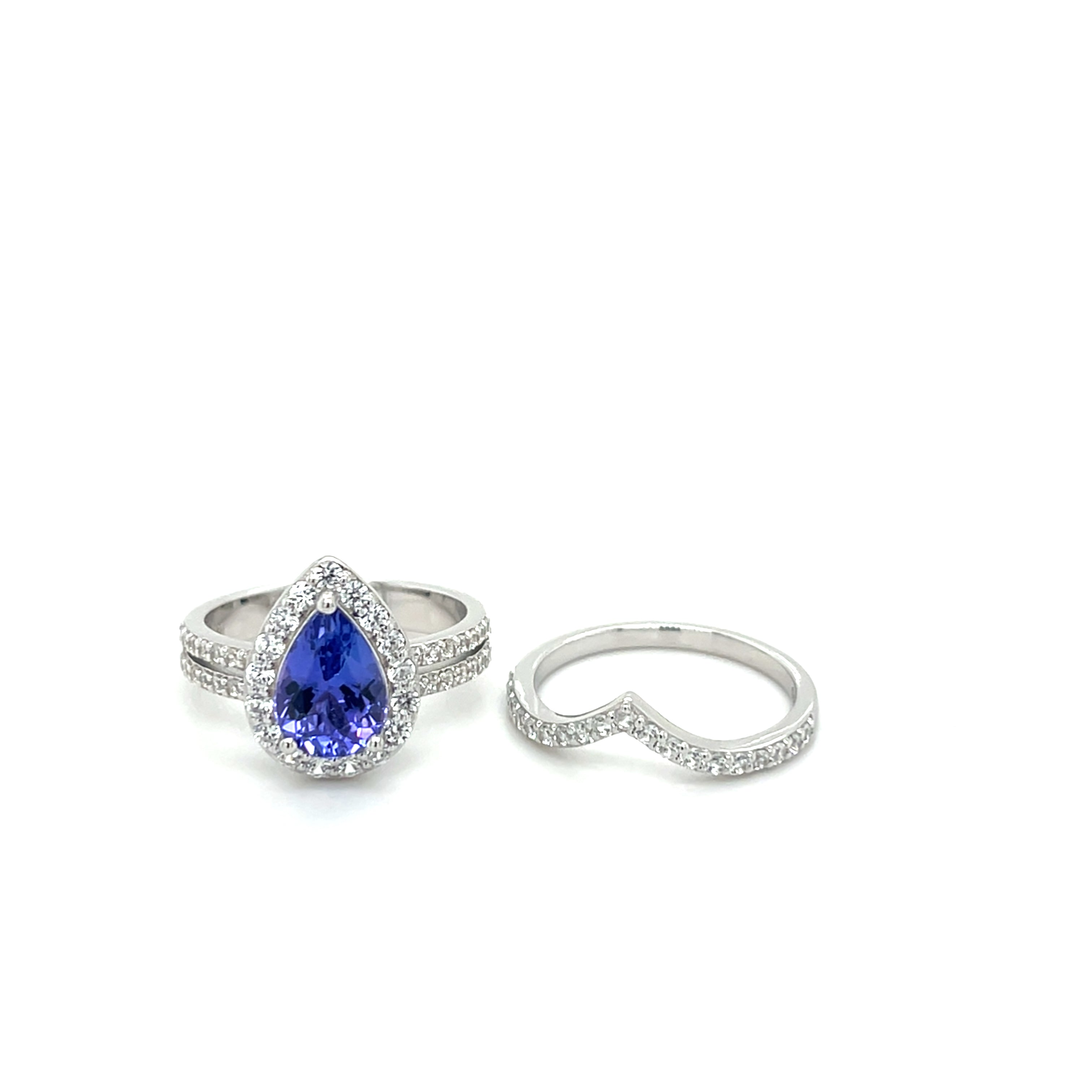 Stunning tanzanite pear ring in 925 sterling silver, rhodium plated with 0.305ct gemstone, perfect for elegant jewelry collection