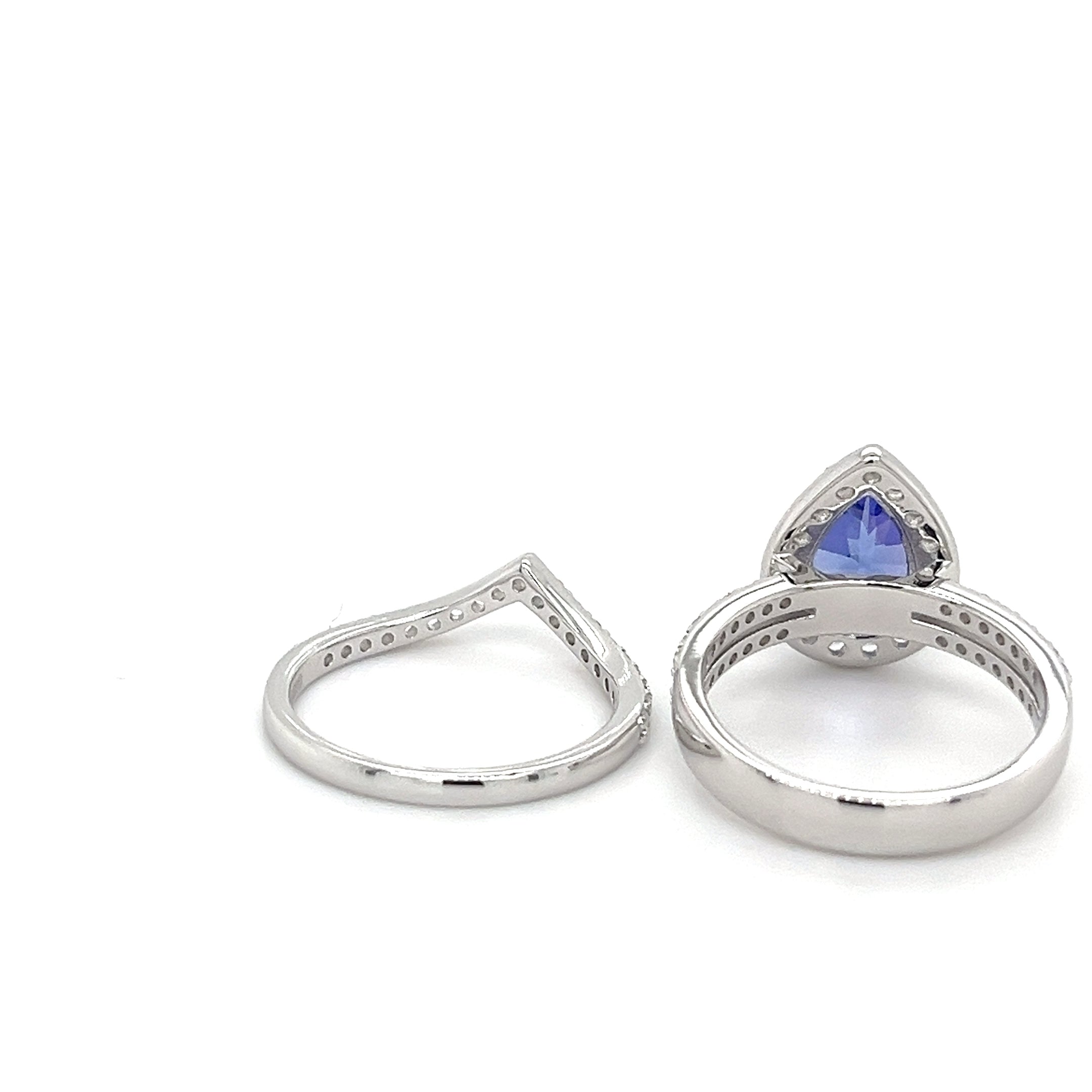 Tanzanite pear ring in 925 sterling silver with rhodium plating and 0.305ct gemstone, showcased beautifully.