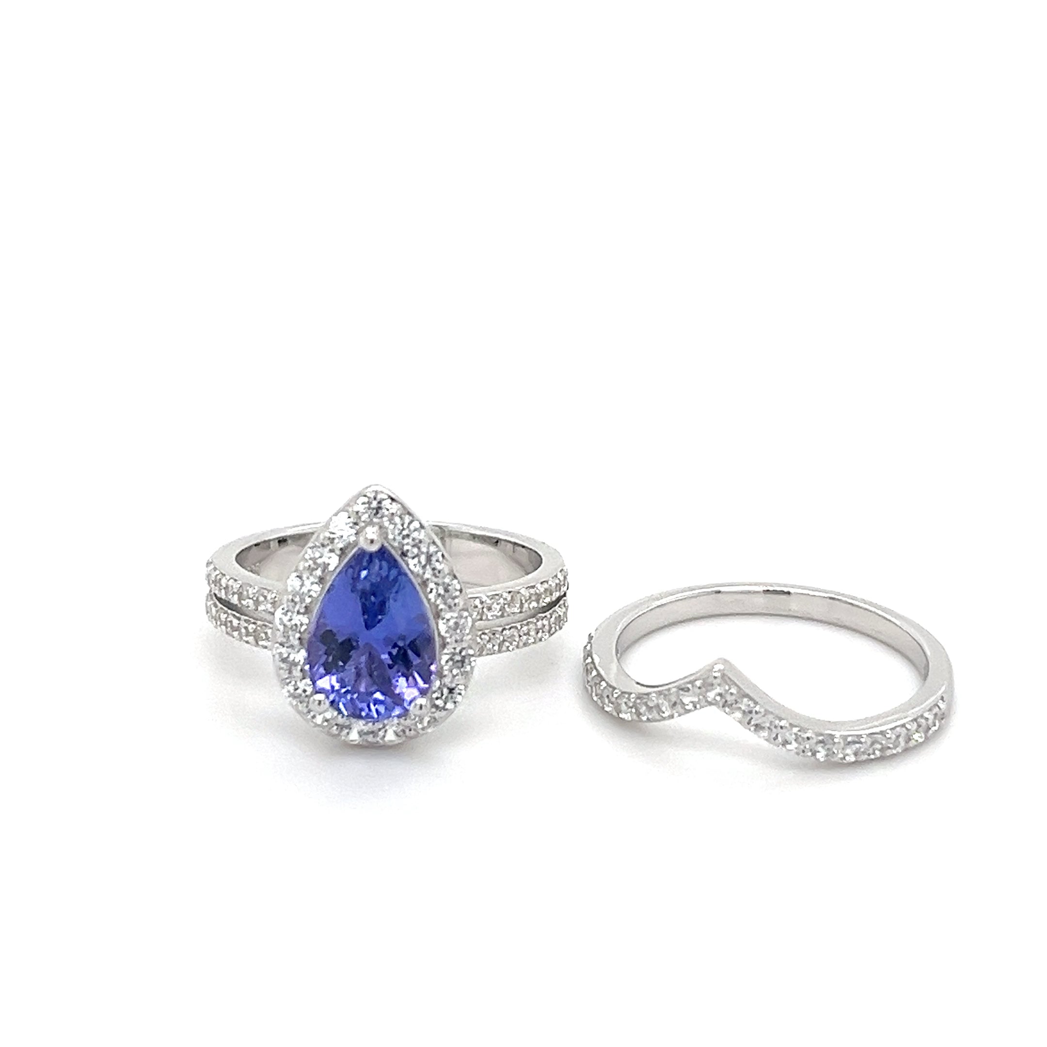 Tanzanite pear ring in 925 sterling silver rhodium plated featuring 0.305ct tanzanite centerpiece