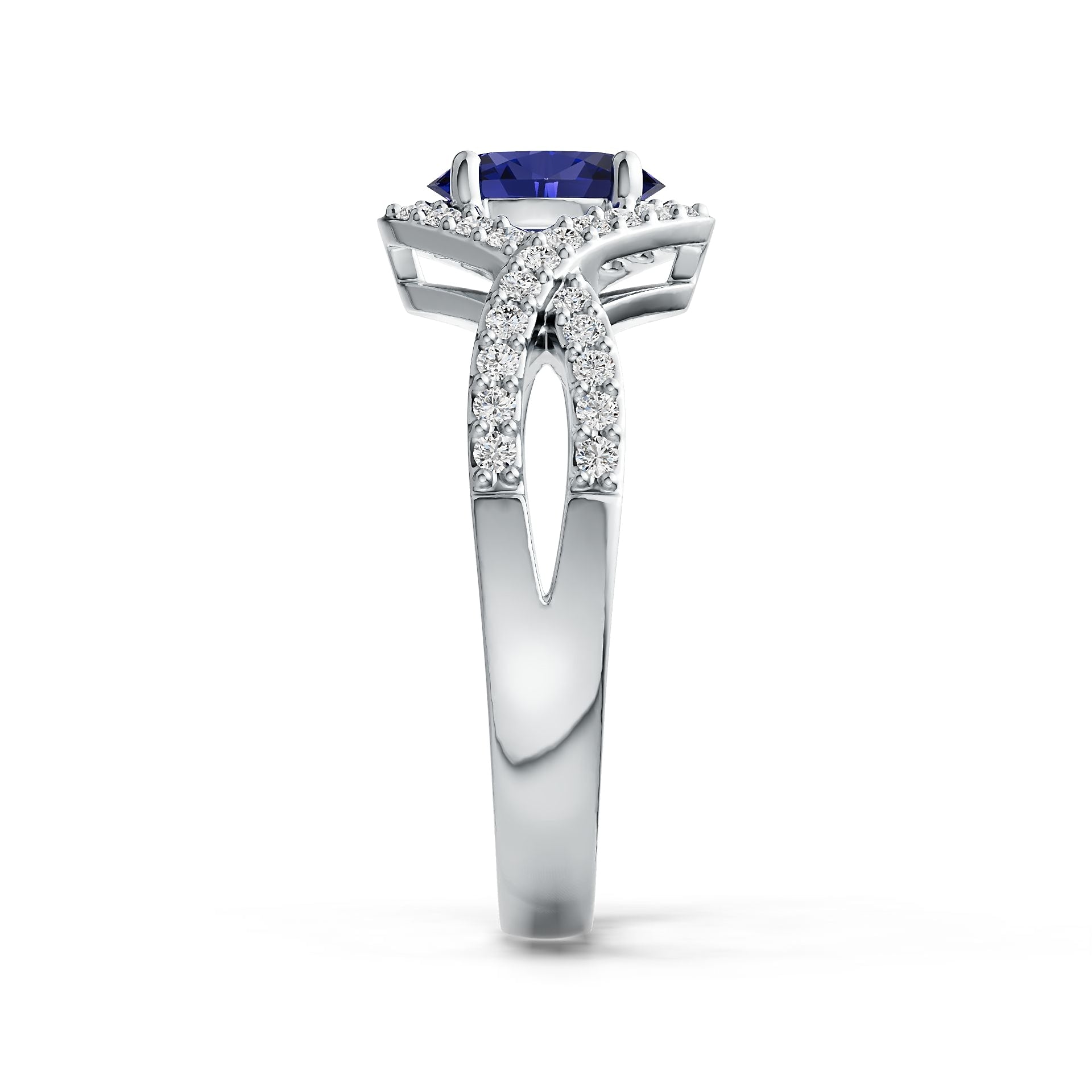 Elegant ring with a Tanzanite gemstone and diamond accents on a white background