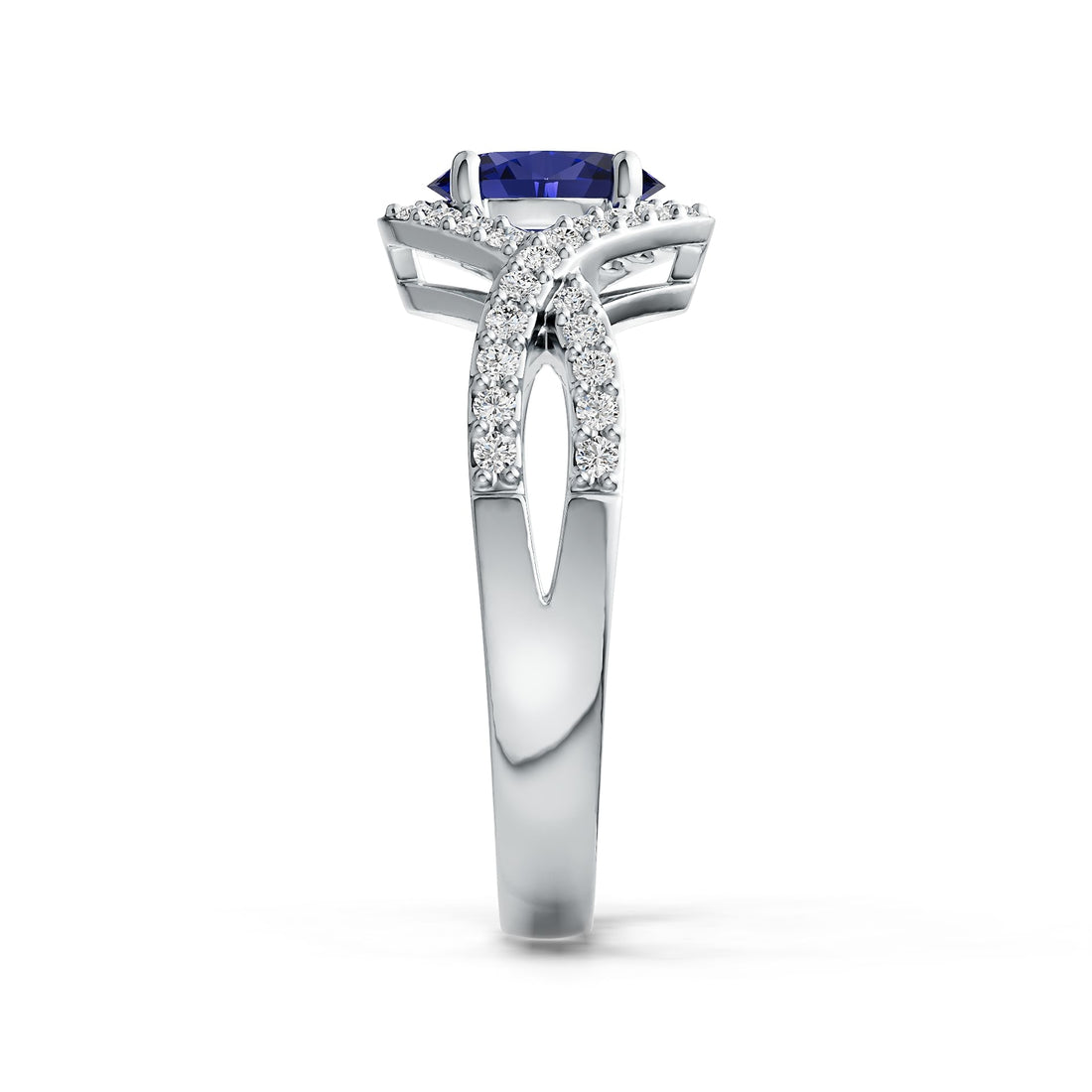 Elegant ring with a Tanzanite gemstone and diamond accents on a white background