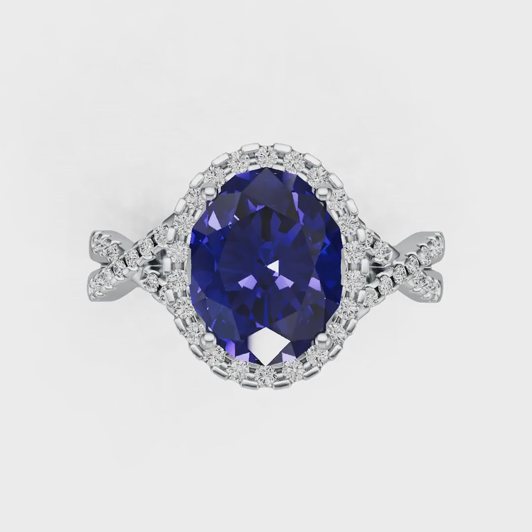 Criss-Cross Halo Infinity Oval Tanzanite Ring with Diamond Accents