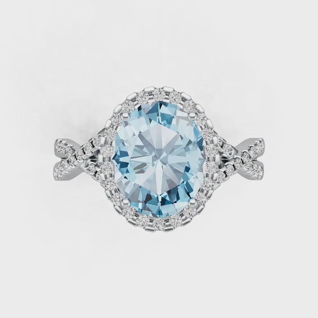 Criss-Cross Halo Infinity Oval Aquamarine Ring with Diamond Accents in 14K Gold