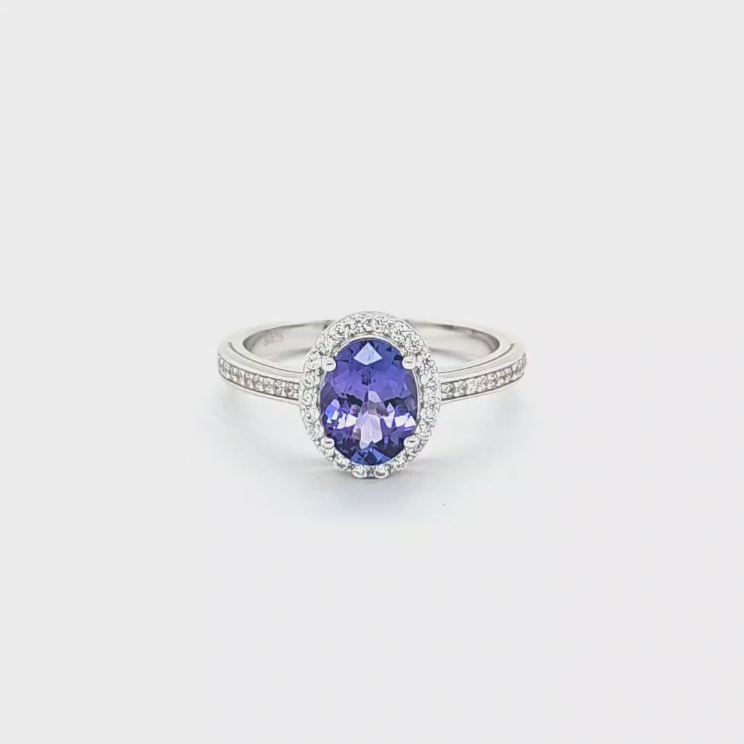Tanzanite Elegance: 1.250 Carat Halo Ring (PJC9021R)
