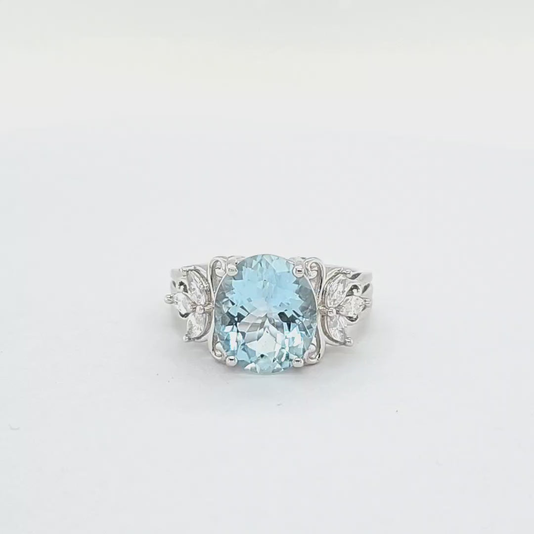 Oval Aquamarine and Marquise White CZ Rhodium Plated 925 Sterling Silver 4.10 Cts / 2.76 Gm Ring For Women's PJC28809R