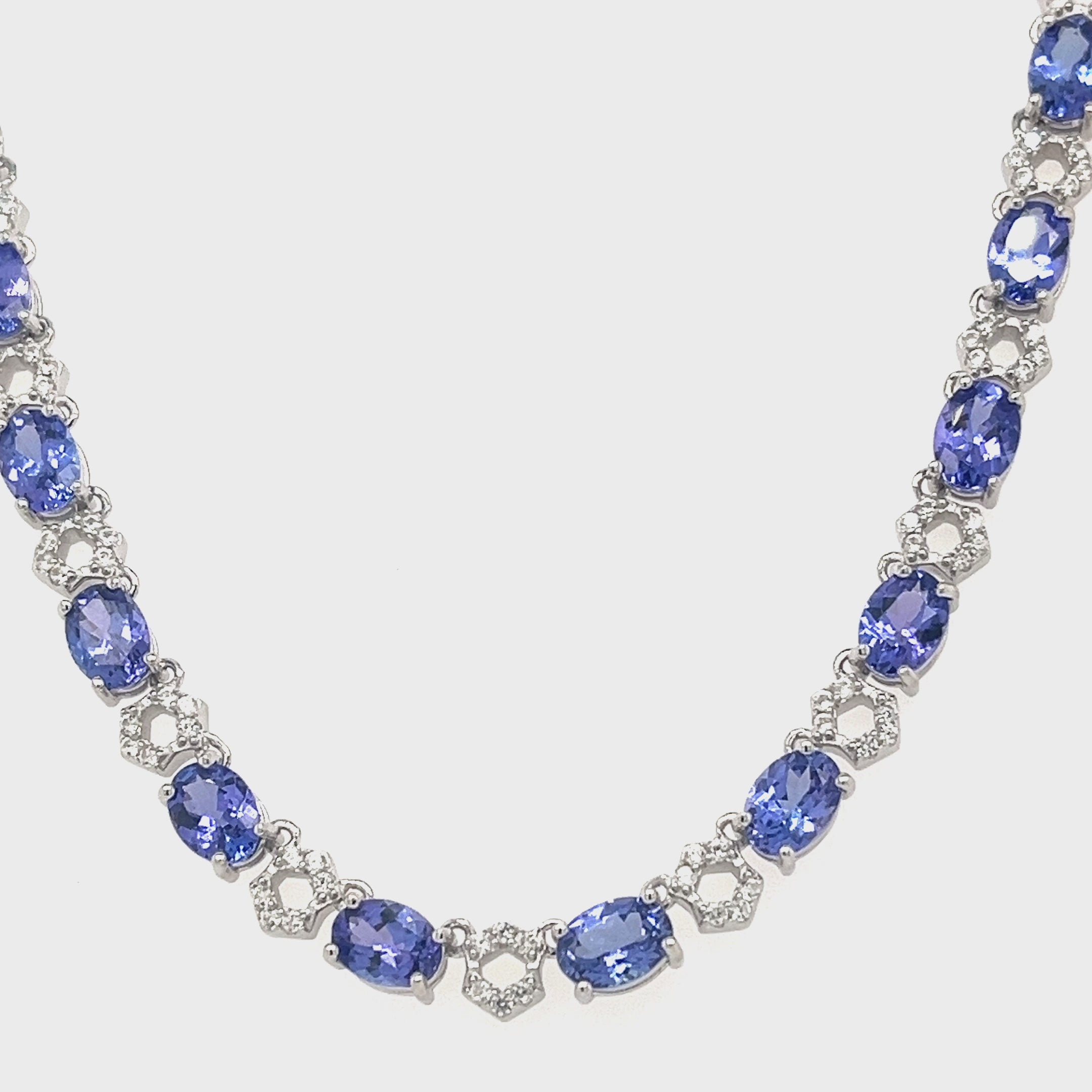 32 Oval-Cut Tanzanite Necklace: A Stunning 27.13 Carat Gemstone (PJC32780N)