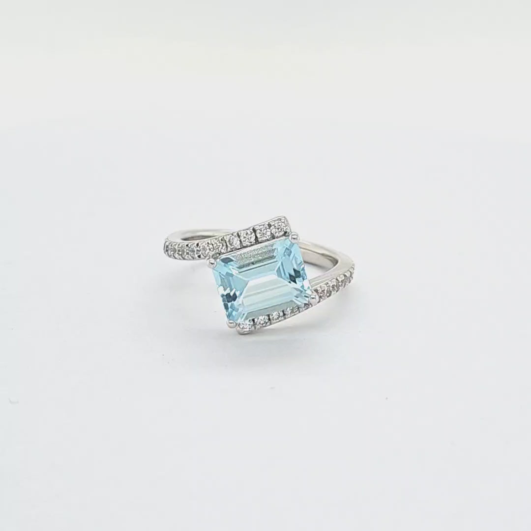 Prong Set Aquamarine Emerald Cut Slipt Shank Engagement Ring with CZ in Sterling Silver