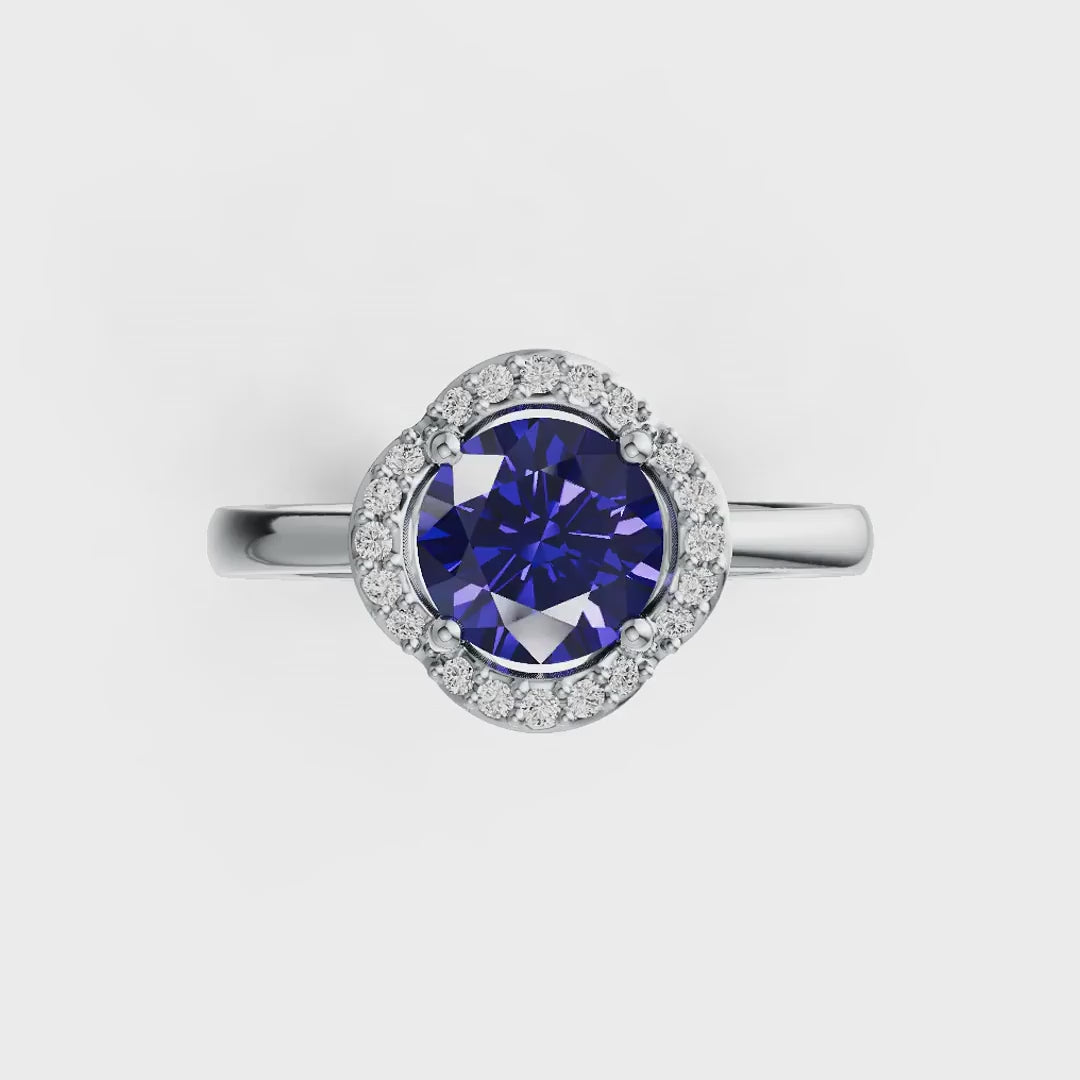 Four Petals Halo Tanzanite Ring in 14K Gold with Diamond Accents & Infinity Shank